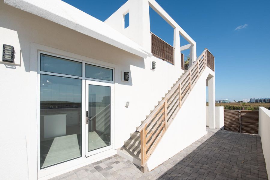 Exterior details and patio area of a home in , Port Aransas (Image 3).