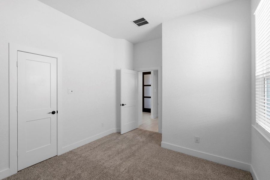 Spacious, unfurnished interior of a new home in Wildrye, Waller (Image 20).