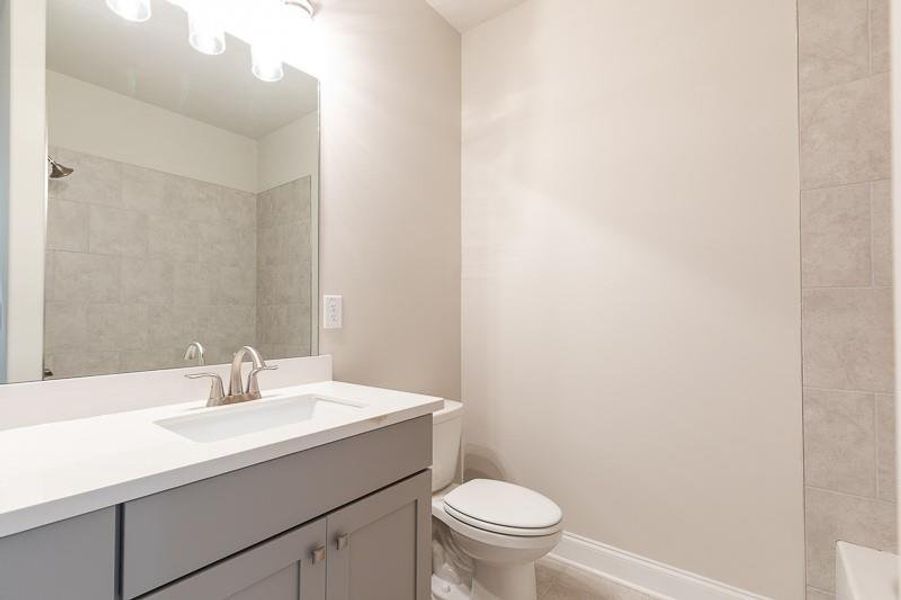 Furnished interior view inside a new home in Waterhaven, Cumming (Image 8).