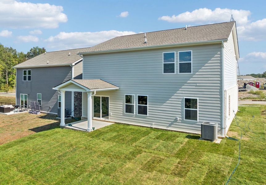 Front exterior of a new home in Cades Bluff, Lebanon, TN, highlighting curb appeal (Image 22).
