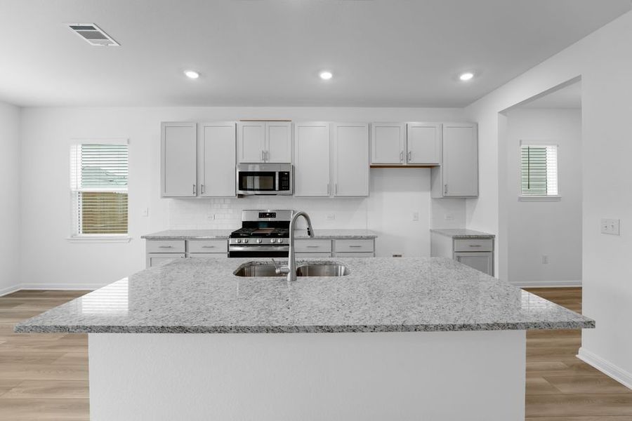 Furnished interior view inside a new home in Longview, Del Valle (Image 4).