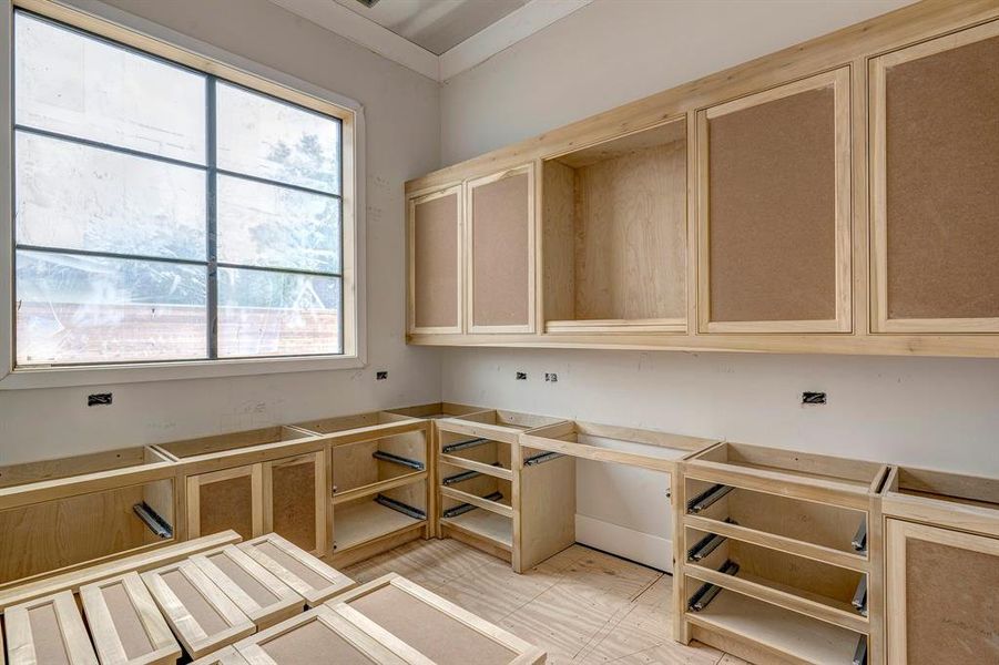 1st floor office with lots of built-ins and large window. Stage of construction as of April 3, 2025. 1st floor office with lots of built-ins and large window. Stage of construction as of April 3, 2025.