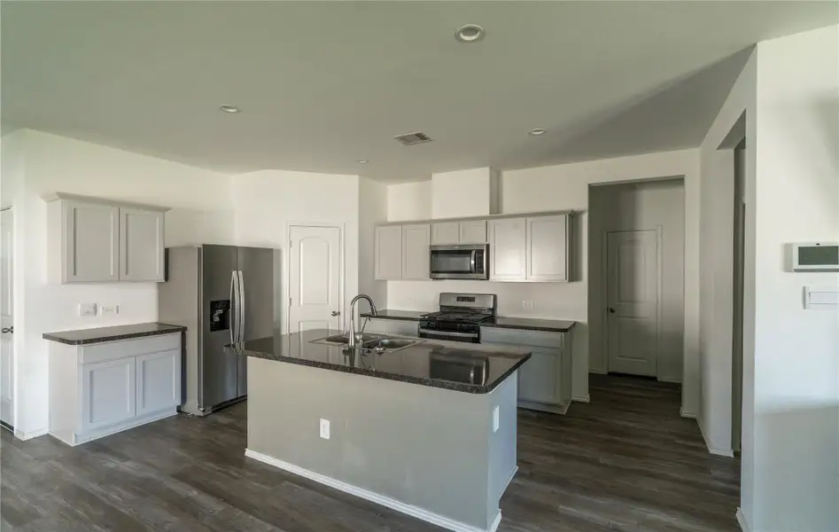 Furnished interior view inside a new home in , Spring (Image 7). Furnished interior view inside a new home in , Spring (Image 7).