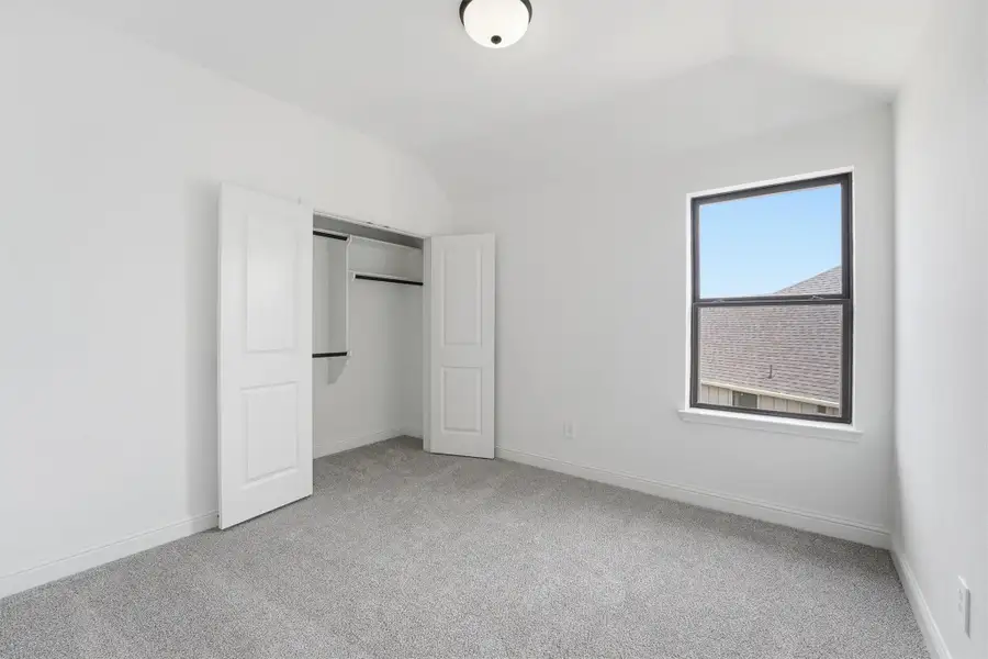 Spacious, unfurnished interior of a new home in Bridgeland, Cypress (Image 9).