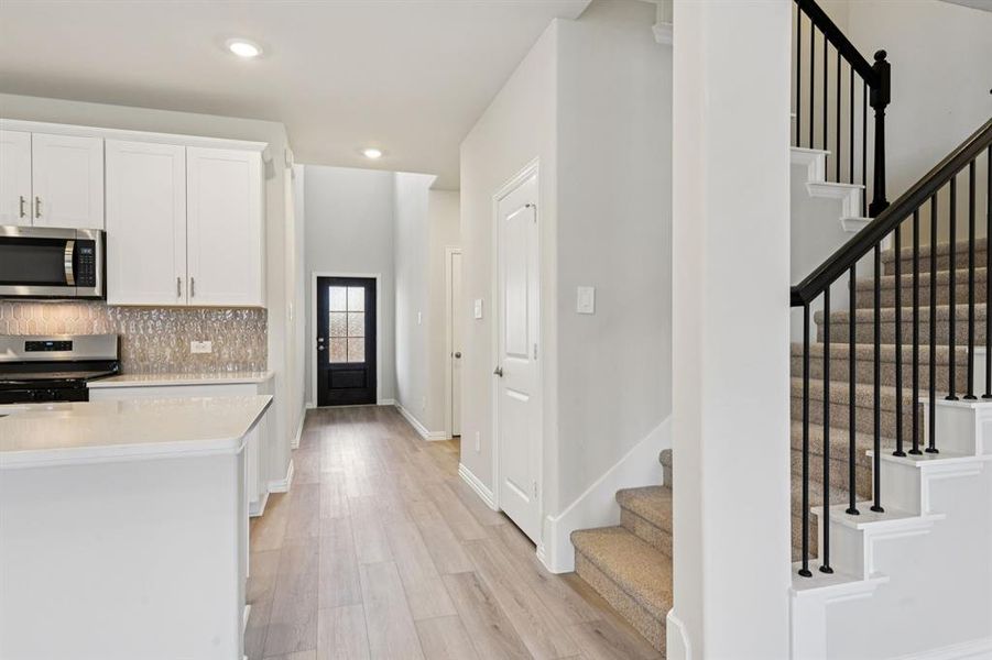 Furnished interior view inside a new home in Parks at Foster Crossing - Signature Series, Anna (Image 12).