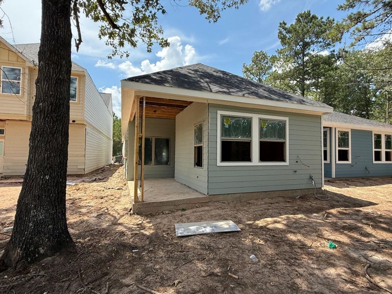 Front exterior of a new home in Kresston, Montgomery, TX, highlighting curb appeal (Image 8).