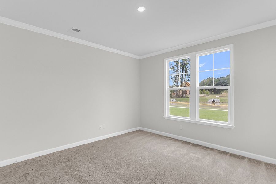 Spacious, unfurnished interior of a new home in Pineland Preserve, Summerville (Image 29).