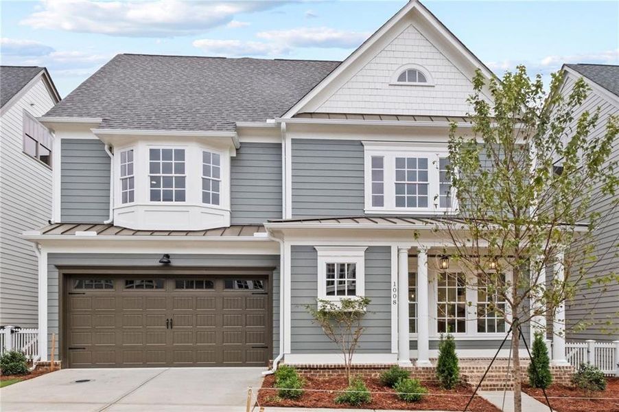 Front exterior of a new home in , Woodstock, GA, highlighting curb appeal (Image 2).