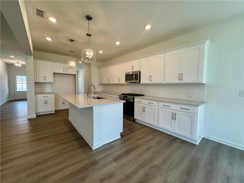 Furnished interior view inside a new home in Eastlyn Crossing - Single Family, Flowery Branch (Image 13). Furnished interior view inside a new home in Eastlyn Crossing - Single Family, Flowery Branch (Image 13).
