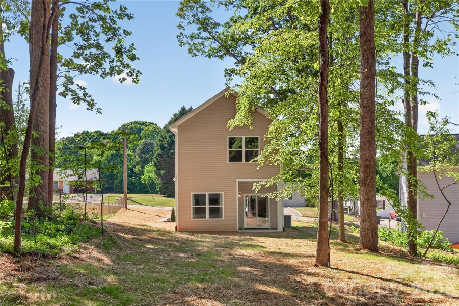 Exterior details and patio area of a home in , Mooresville (Image 26).