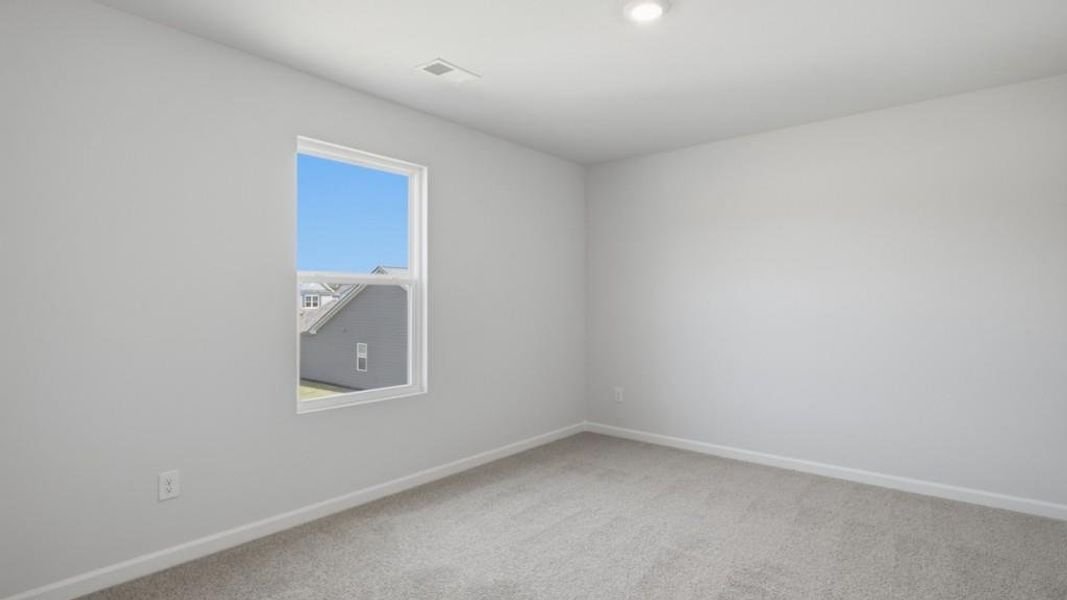 Spacious, unfurnished interior of a new home in Fairway 17 at Mirror Lake, Villa Rica (Image 23).