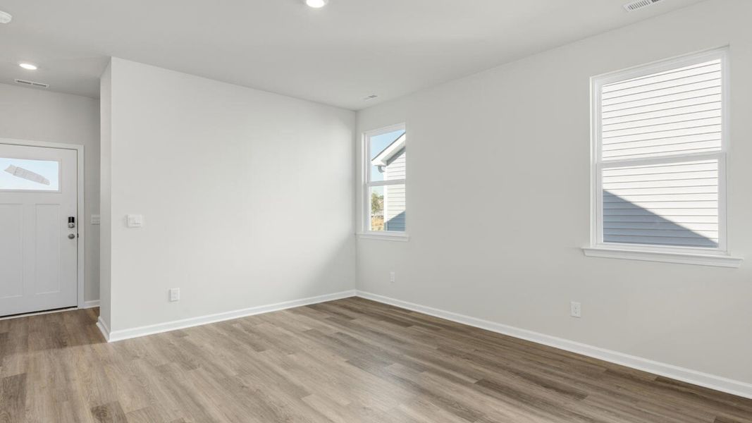 Representative unfurnished interior of a home built from the PERRY by D.R. Horton in The Cottages at Blake Farm, Wilmington (Image 8).