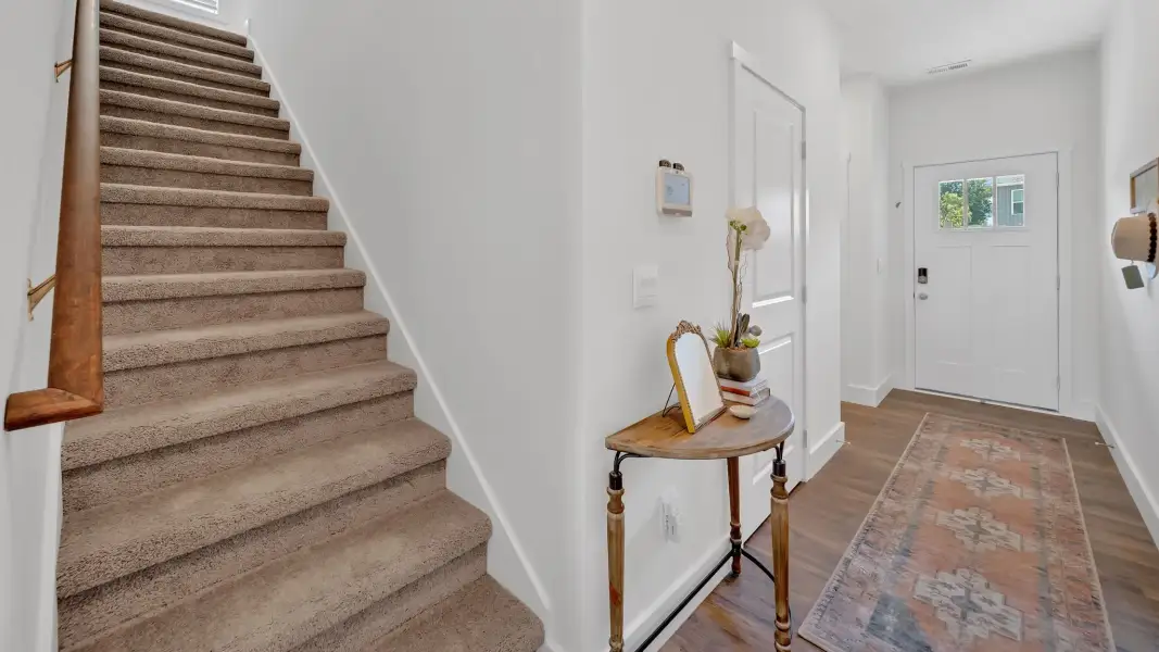Representative furnished interior of a home built from the Mitchell Townhome by D.R. Horton in Oak Vista, Knoxville (Image 9).