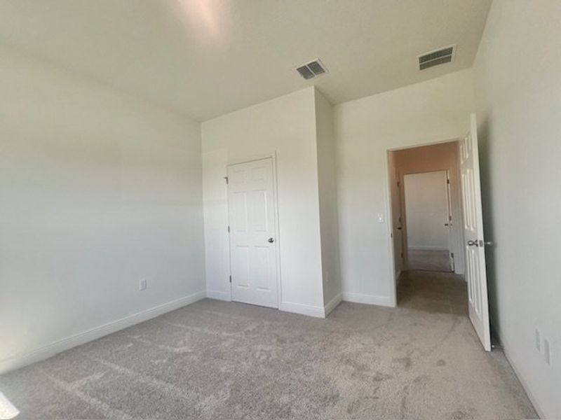 Spacious, unfurnished interior of a new home in Lakes At St Sebastian, Micco (Image 13).