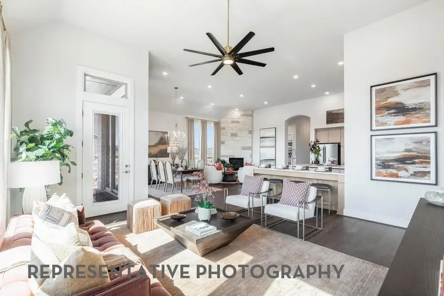 Furnished interior view inside a new home in Meridiana, Manvel (Image 4).