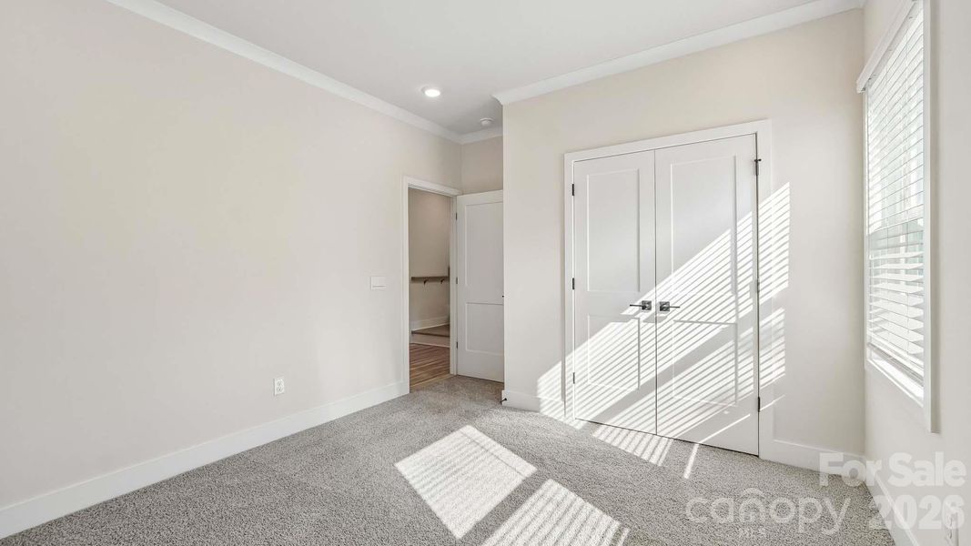 Spacious, unfurnished interior of a new home in The Townes at Lake Norman, Mooresville (Image 29).