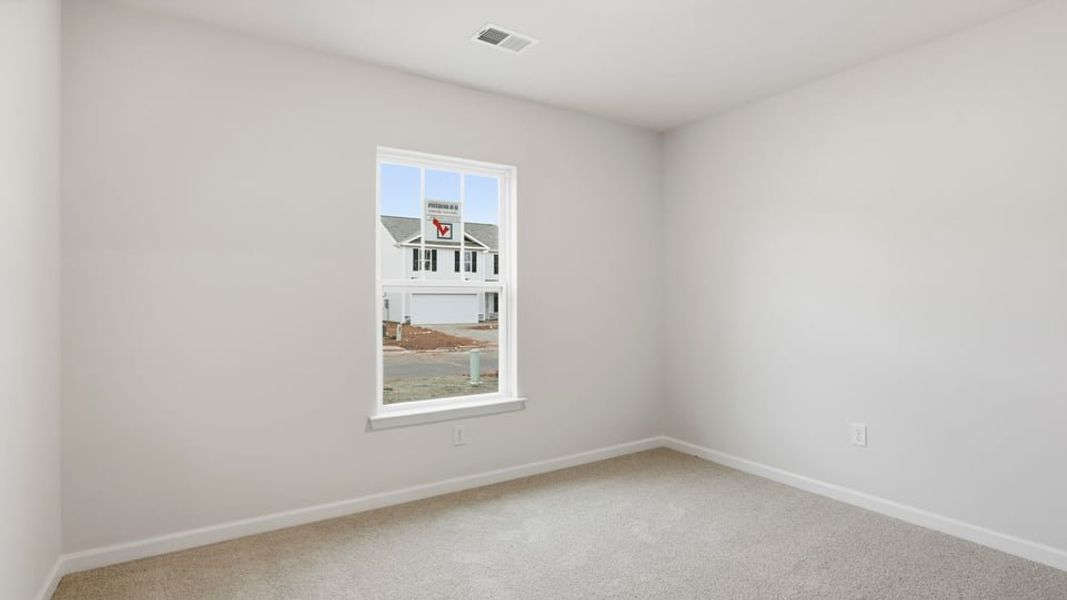 Spacious, unfurnished interior of a new home in Bentley Park, Greenwood (Image 13).