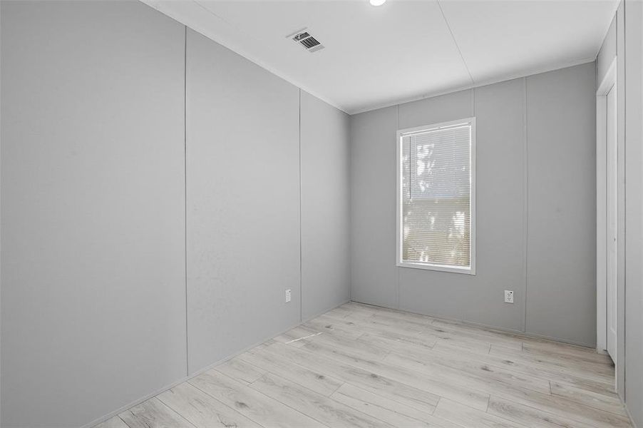 Empty room with light wood-style flooring Empty room with light wood-style flooring