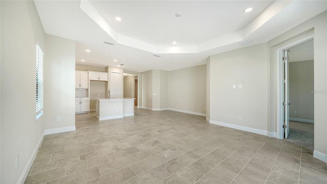 Spacious, unfurnished interior of a new home in Vicenza Real Estate and Homes for Sale in North Venice, FL - Neal Communities, Nokomis (Image 31).