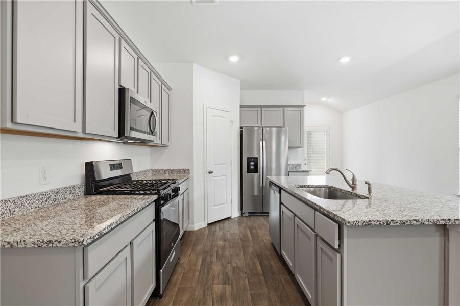 Featuring durable granite countertops, sleek stainless steel appliances (al included), excellent cabinetry storage, and a corner pantry. Featuring durable granite countertops, sleek stainless steel appliances (al included), excellent cabinetry storage, and a corner pantry.