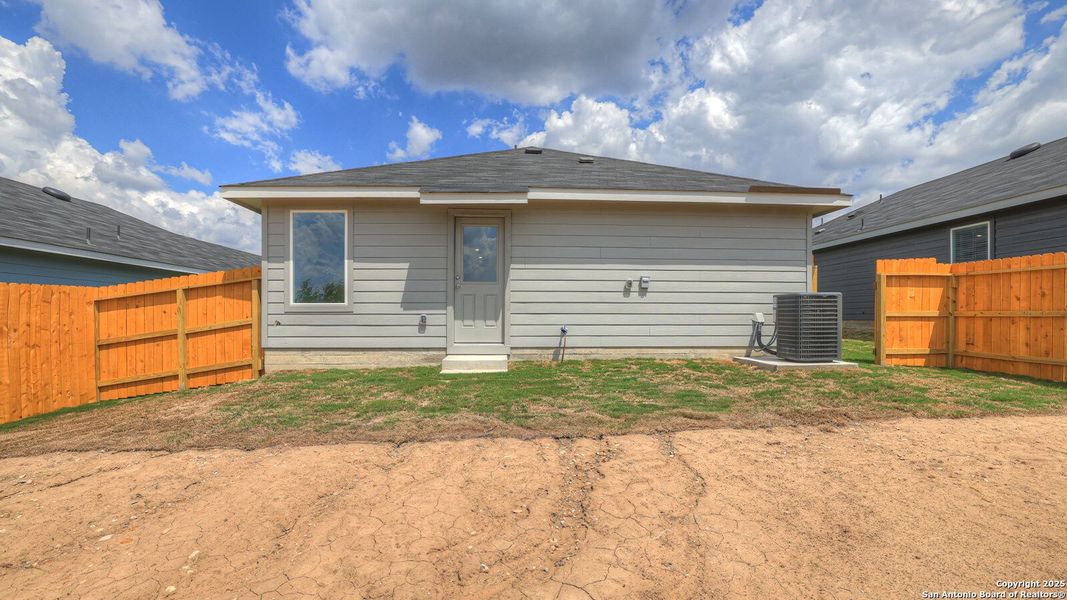 Front exterior of a new home in Ladera, Luling, TX, highlighting curb appeal (Image 1).