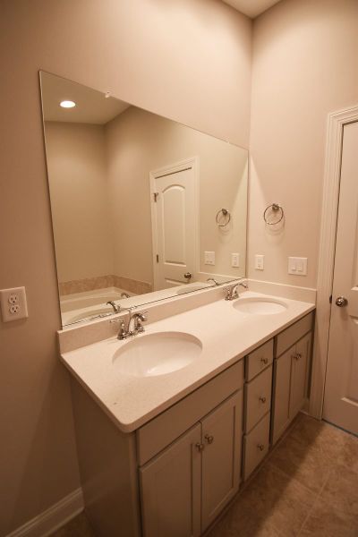 Representative furnished interior of a home built from the Cayman X by Keystone Homes NC in Trellises, High Point (Image 42).