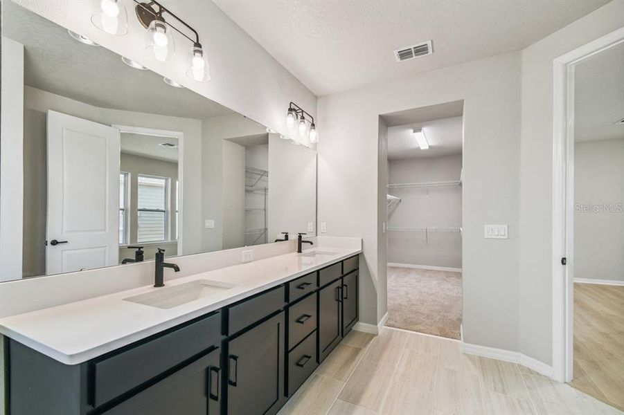 Furnished interior view inside a new home in Weslyn Park in Sunbridge 34', St. Cloud (Image 5).