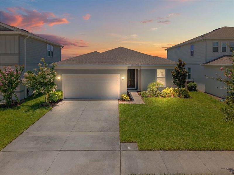 Front exterior of a new home in , St. Cloud, FL, highlighting curb appeal (Image 22).
