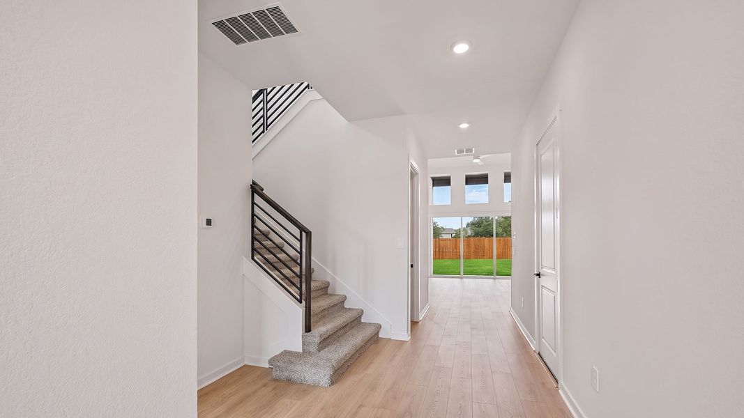 Spacious, unfurnished interior of a new home in The Enclave at Bar W Ranch, Leander (Image 17).