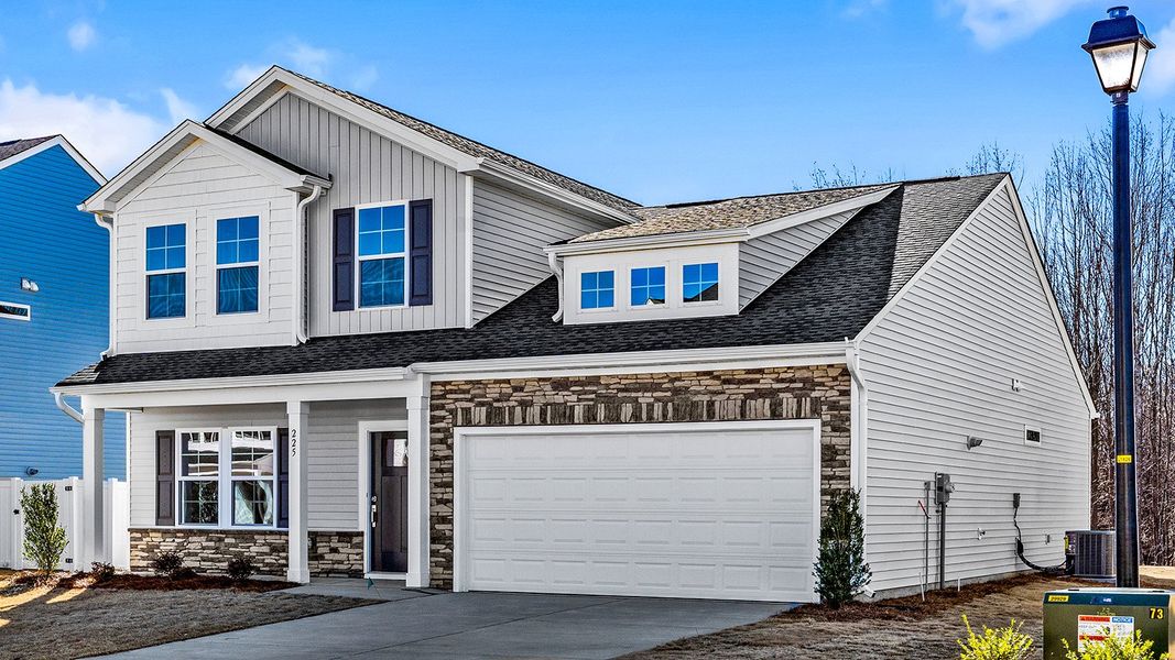 Front exterior of a new home in Fieldstone, Lexington, NC, highlighting curb appeal (Image 19). Front exterior of a new home in Fieldstone, Lexington, NC, highlighting curb appeal (Image 19).