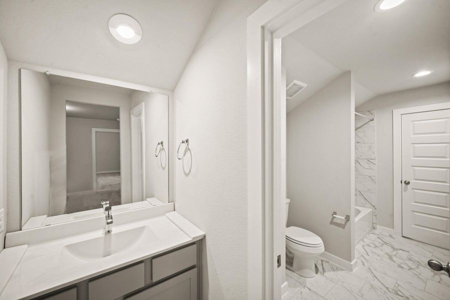 Furnished interior view inside a new home in Sunterra North, Katy (Image 6). Furnished interior view inside a new home in Sunterra North, Katy (Image 6).