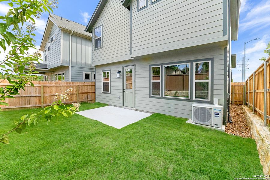 Front exterior of a new home in Trilogy Grove, Leon Valley, TX, highlighting curb appeal (Image 18). Front exterior of a new home in Trilogy Grove, Leon Valley, TX, highlighting curb appeal (Image 18).
