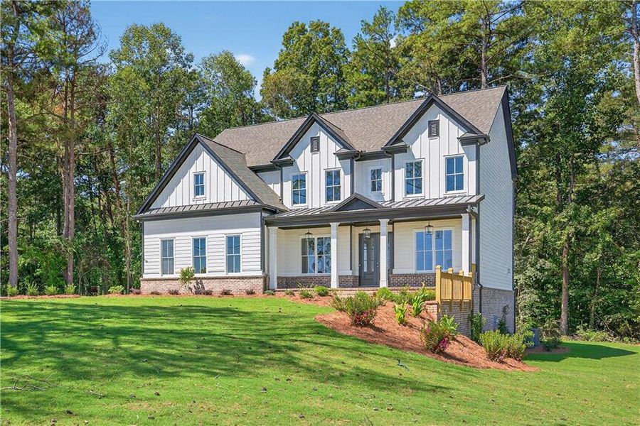 Front exterior of a new home in , Cumming, GA, highlighting curb appeal (Image 33). Front exterior of a new home in , Cumming, GA, highlighting curb appeal (Image 33).