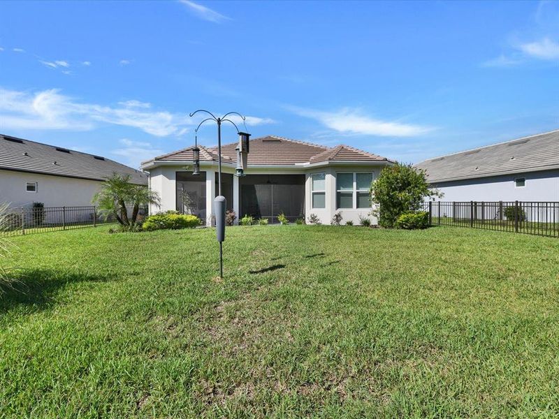 Exterior details and patio area of a home in , Wesley Chapel (Image 24).