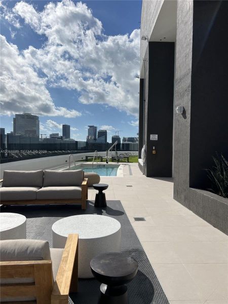 Exterior details and patio area of a home in , Miami (Image 2). Exterior details and patio area of a home in , Miami (Image 2).