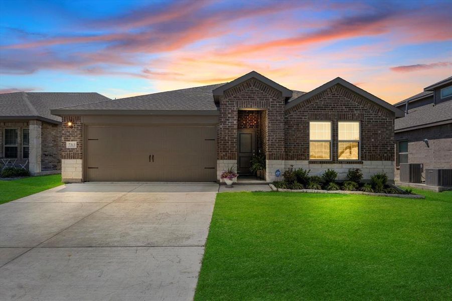 Front exterior of a new home in Millstone, McKinney, TX, highlighting curb appeal (Image 1). Front exterior of a new home in Millstone, McKinney, TX, highlighting curb appeal (Image 1).