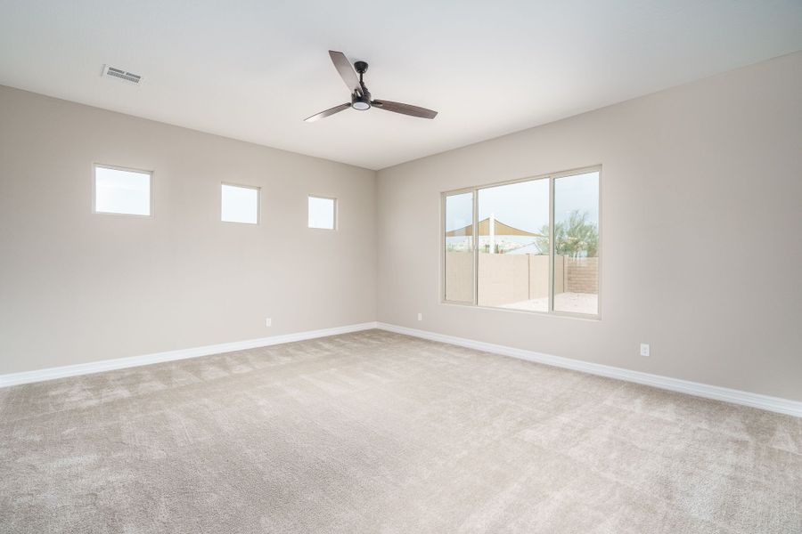 Spacious, unfurnished interior of a new home in Harmony at Montecito in Estrella, Goodyear (Image 36).