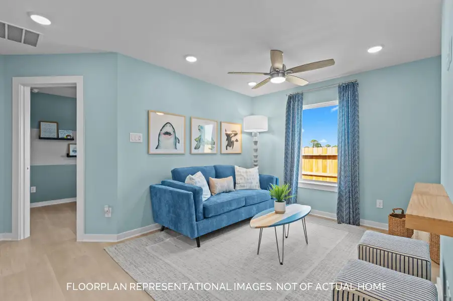 Furnished interior view inside a new home in Lone Star Landing, Montgomery (Image 10).