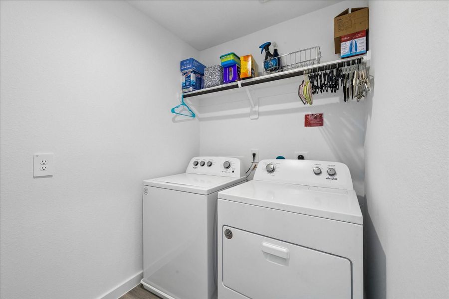 Utility room is spacious and conveniently located upstairs. Utility room is spacious and conveniently located upstairs.