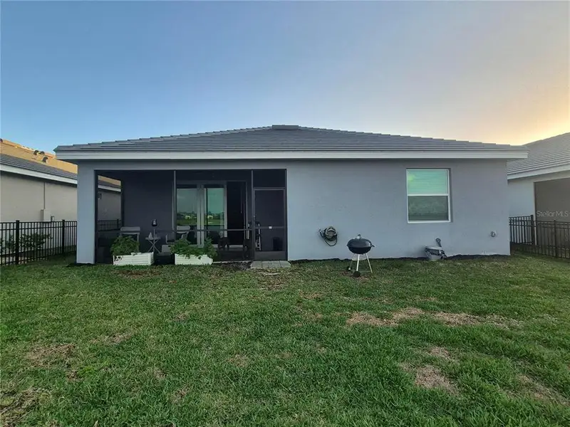 Exterior details and patio area of a home in , Englewood (Image 3).