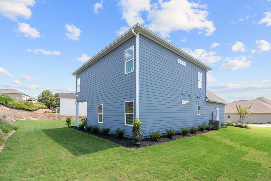 Exterior details and patio area of a home in The Stiles, Cartersville (Image 3). Exterior details and patio area of a home in The Stiles, Cartersville (Image 3).