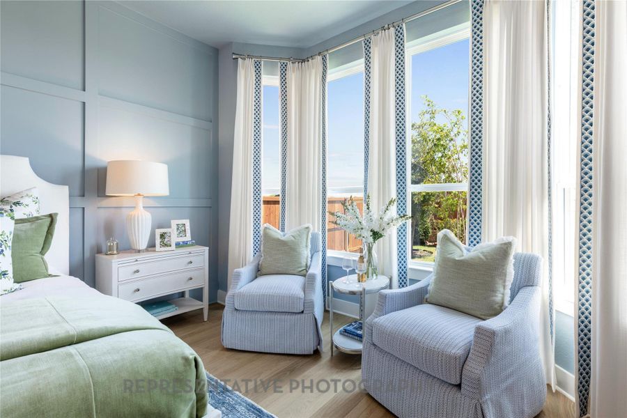 Bedroom with wood finished floors