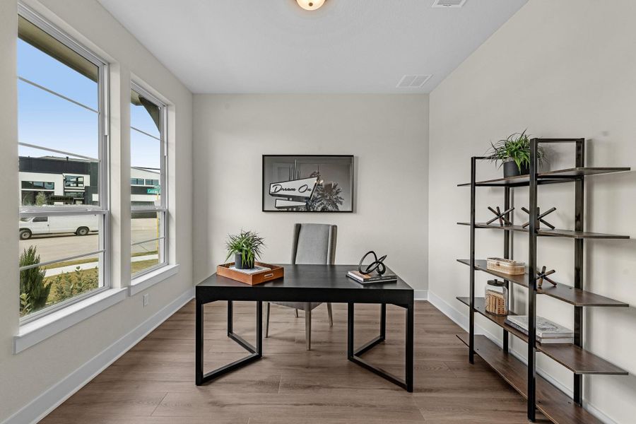Furnished interior view inside a new home in Bridgeland, Cypress (Image 28).
