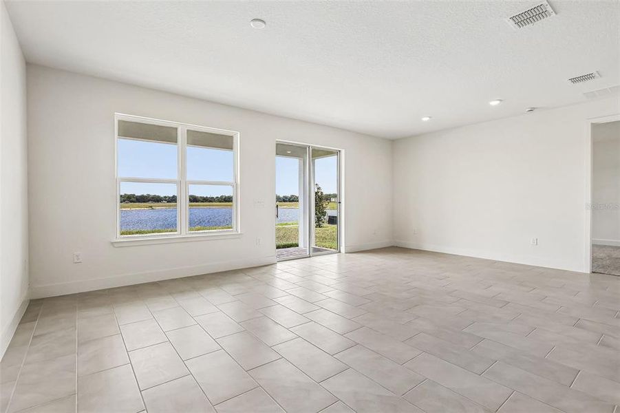 Spacious, unfurnished interior of a new home in Lakeside at Satilla, St. Cloud (Image 26).