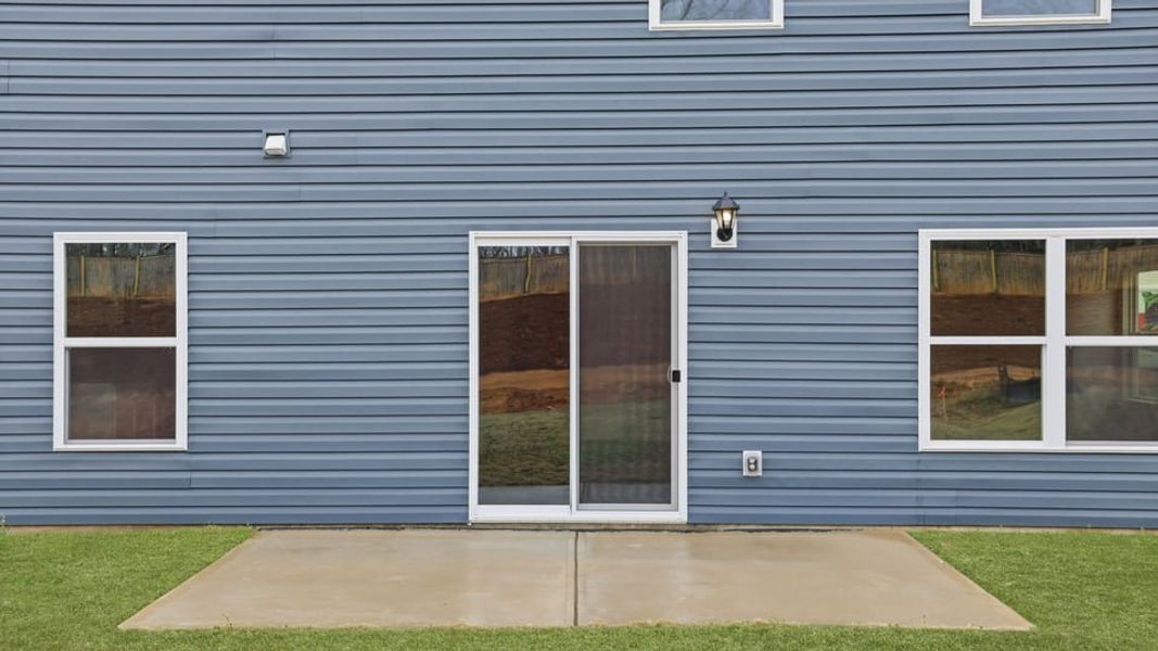 Exterior details and patio area of a home in Lakestone, Woodruff (Image 21).