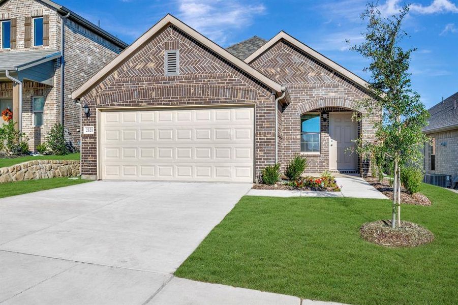 Front exterior of a new home in ValleyBrooke, Mesquite, TX, highlighting curb appeal (Image 20). Front exterior of a new home in ValleyBrooke, Mesquite, TX, highlighting curb appeal (Image 20).