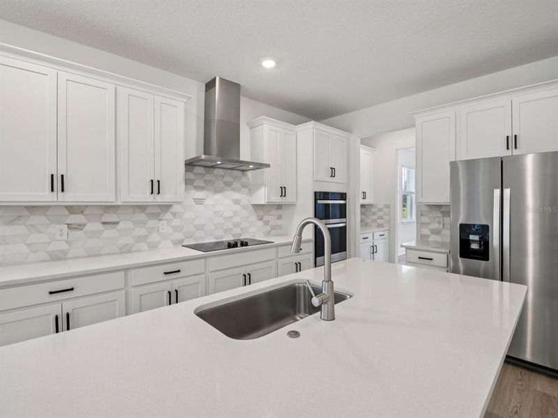 Furnished interior view inside a new home in Ridgehaven - Signature Series, Ormond Beach (Image 3).