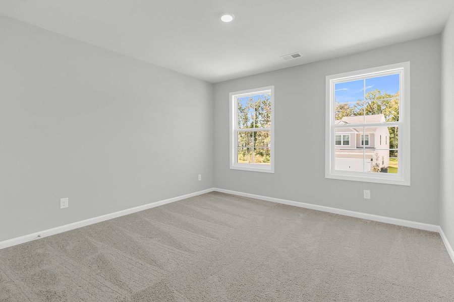 Spacious, unfurnished interior of a new home in Central Creek, Goose Creek (Image 26).