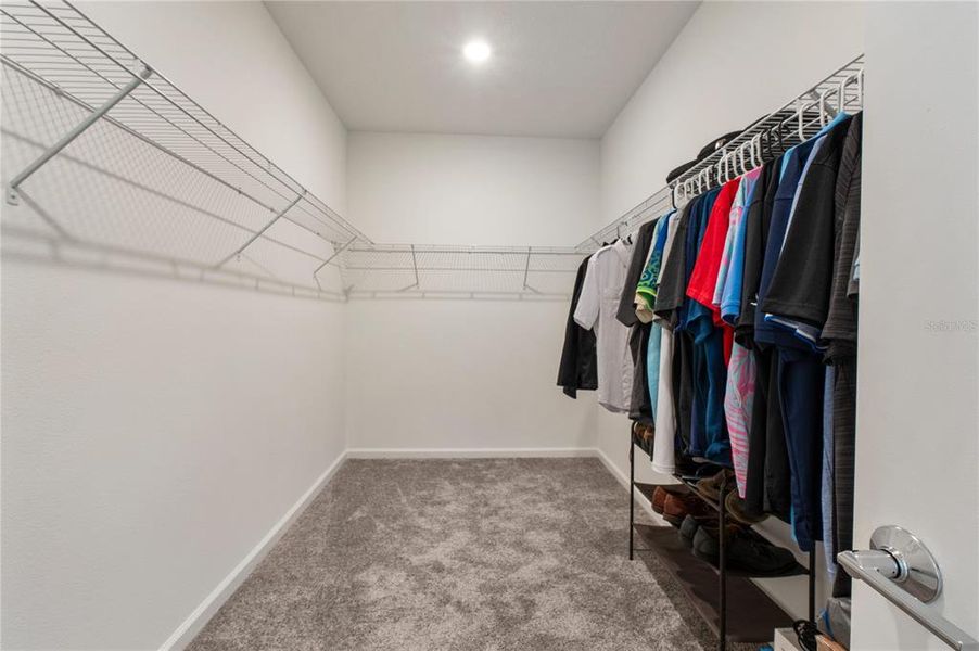 Spacious, unfurnished interior of a new home in Wellness Ridge: Estates Collection, Clermont (Image 19).