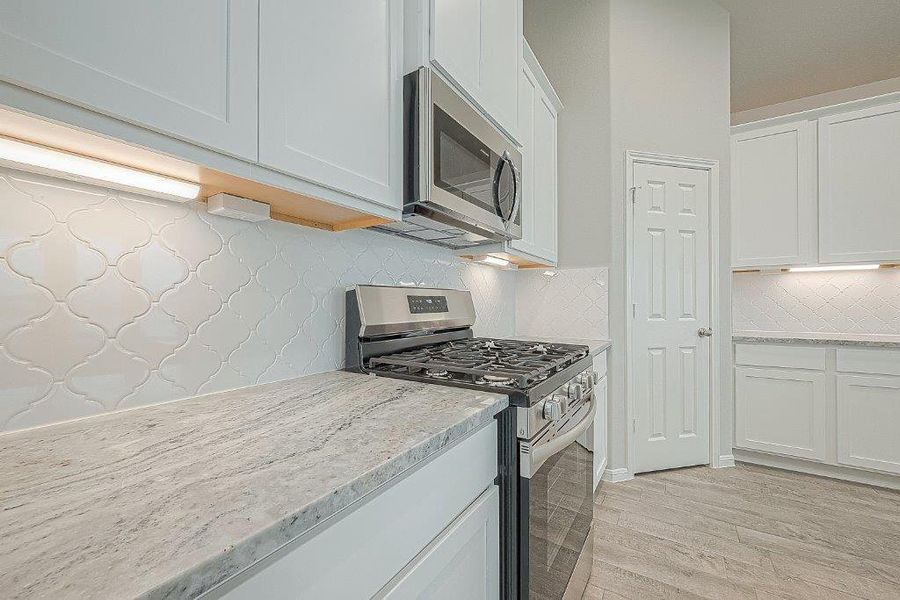 Furnished interior view inside a new home in Grand Magnolia, Magnolia (Image 25).